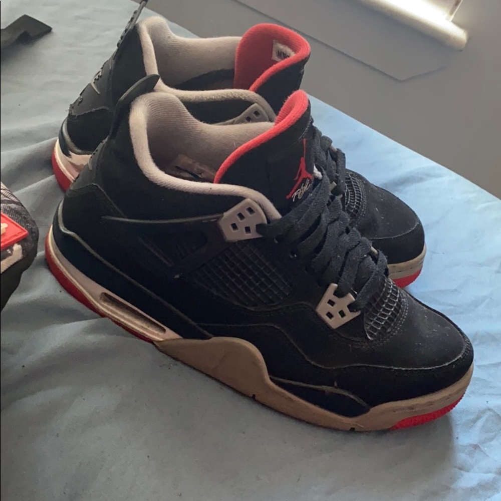 - black & red jordan 4s